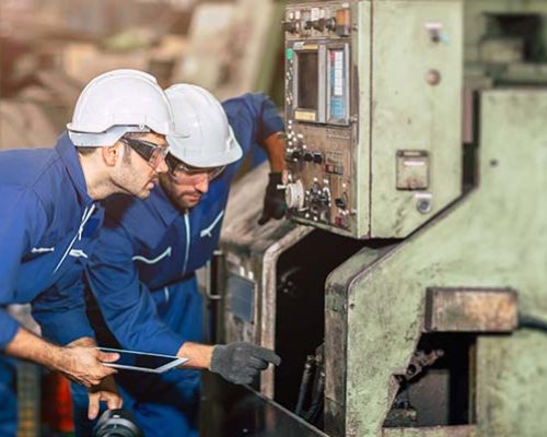 Engineer checking machine maintenance service with team working Engineer checking machine maintenance service with team working together teamwork in steel heavy factory